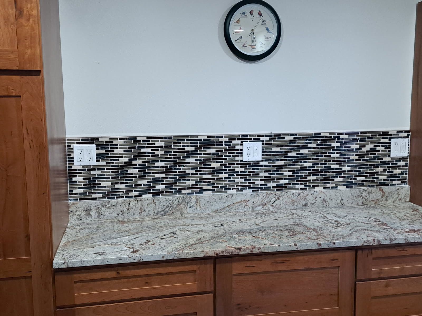 Gallery photos for Kitchen Transformation with Sleek Backsplash and Stylish Wooden Cabinets: Image #1