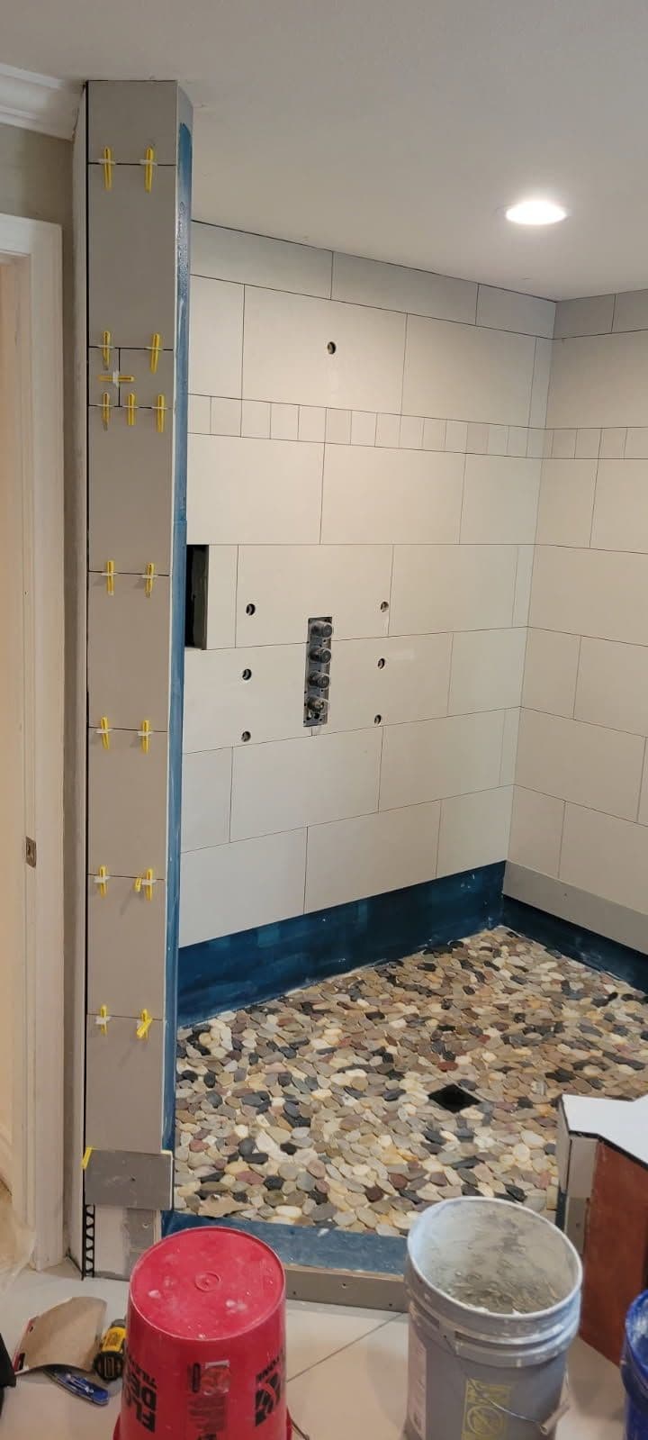 Project Bathroom Remodel Featuring Stone Pebble Floor image