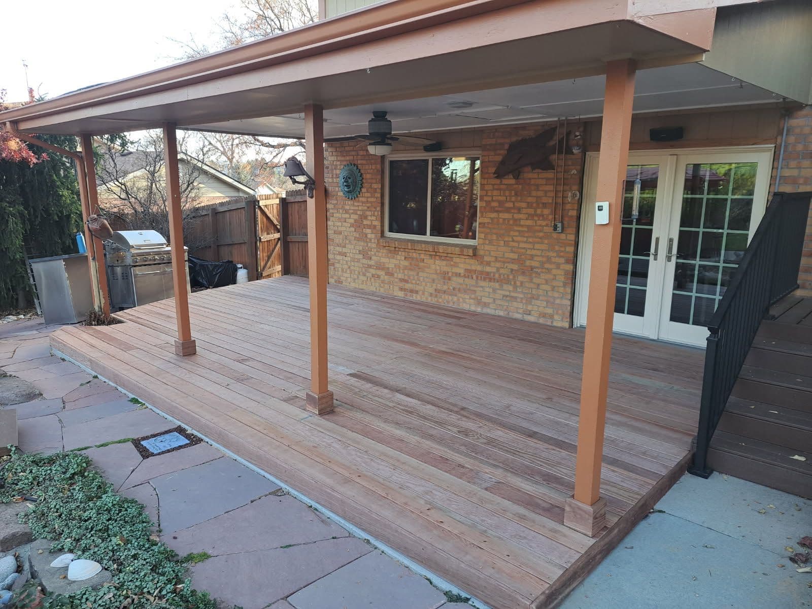 New Covered Deck Installation with Rustic Charm