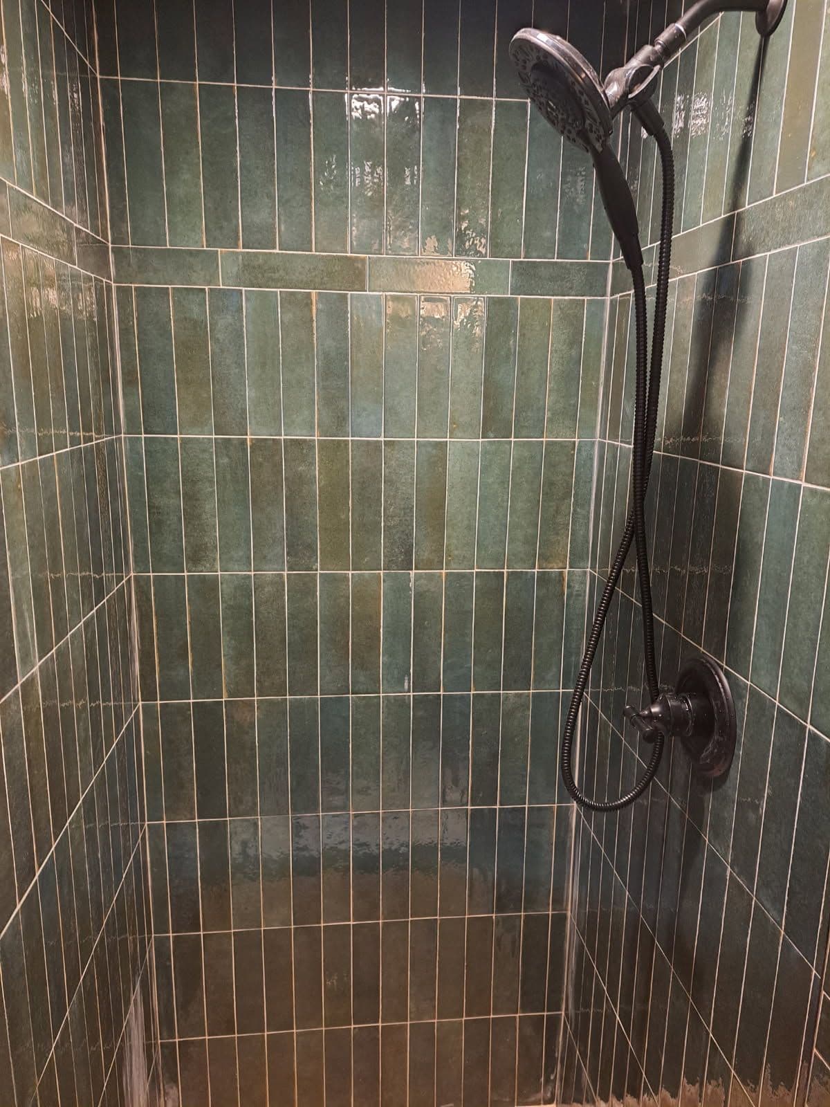 Project Small Shower Face Lift with Green Tiles and Black Showerhead image