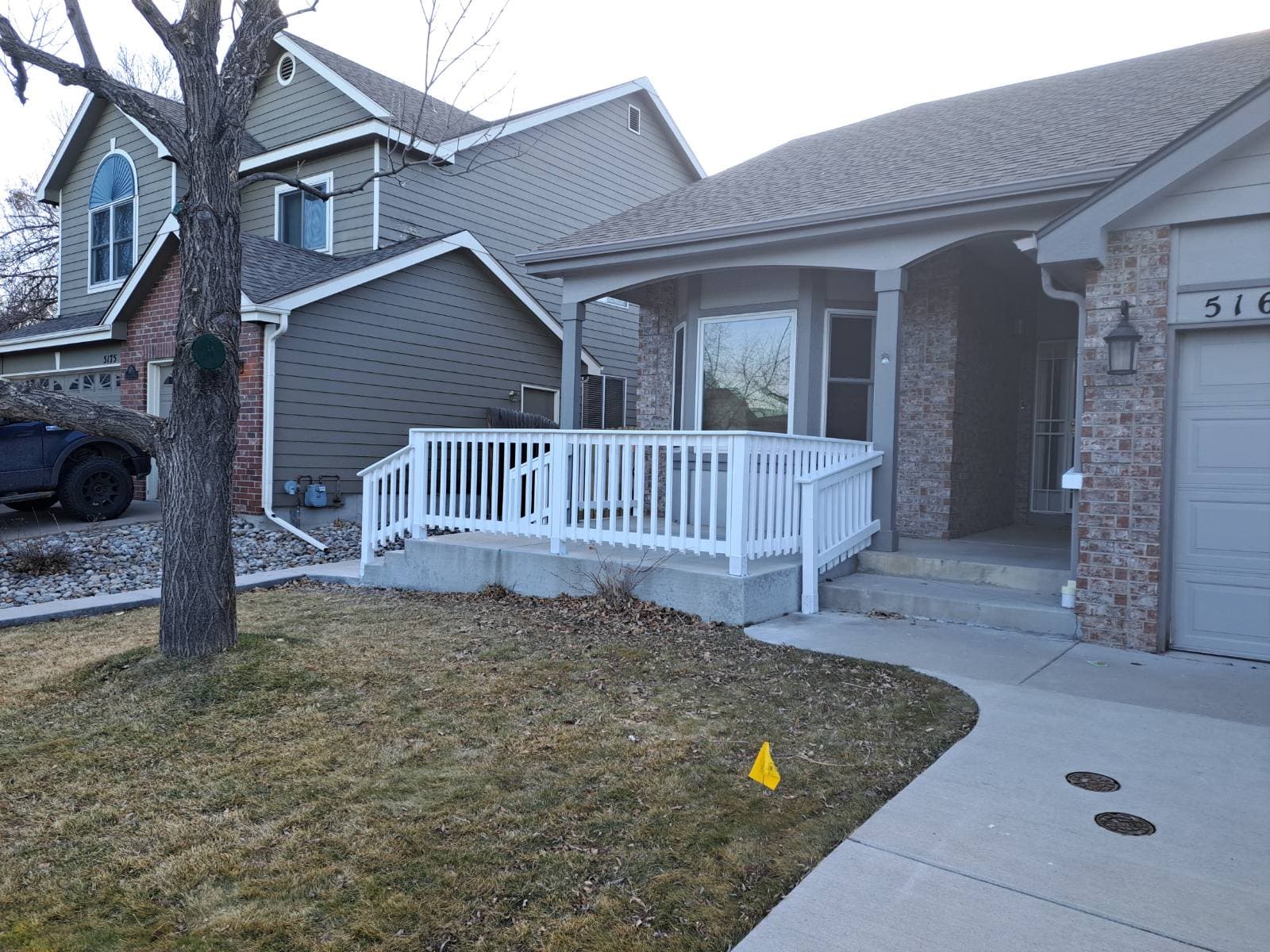 Porch Makeover with Stylish White Railing