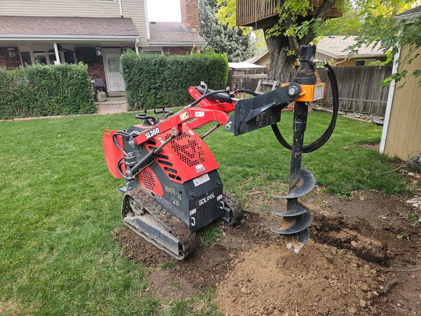 Mini Skid-Steer Enhances Backyard Projects image